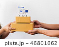 delivery man send parcel with mini trolley 46801662