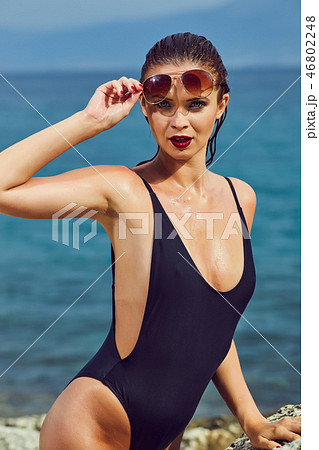 Beautiful woman on the beach.  Summer holiday 46802248