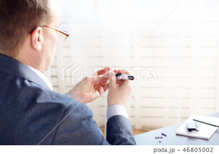 Middle age Man Pierce his fingertip Middle age Man Pierce his fingertip 46805002