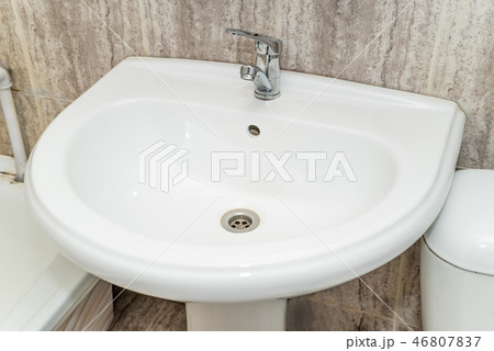 The photo of a sink in a bathroom 46807837