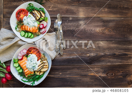 Grilled salmon with vegetables and quinoa 46808105