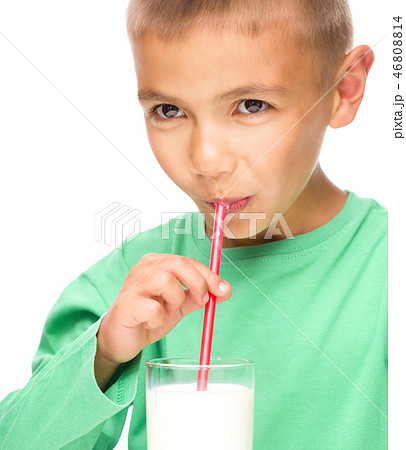 Cute little boy with a glass of milk 46808814