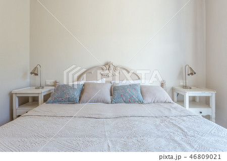 Bedroom in modern style with bed and pillows. Front view 46809021