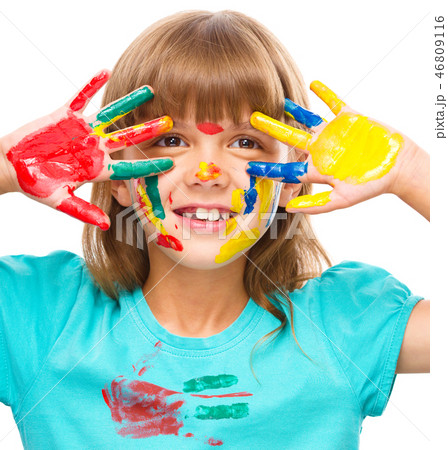 Portrait of a cute girl playing with paints 46809116