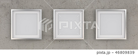 3 Square Picture Frames of Metal on Concrete Wall. 46809839