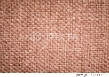 Textured background surface of textile upholstery furniture close-up. burlap brown color fabric 46811328