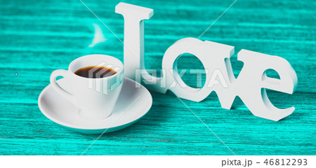 Word love and cup of coffee. 46812293