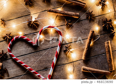 Sweet candy and Christmas lights around  46813690