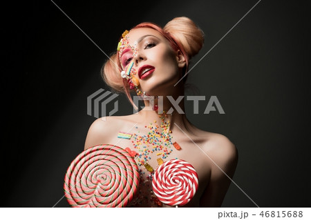 Woman with sweets and caramel on her face 46815688