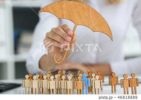 Smiling Business woman in hand holds a miniature 46818889