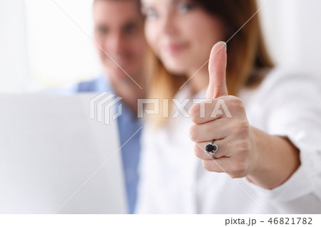 Female hand showing ok or approval sign with thumb 46821782
