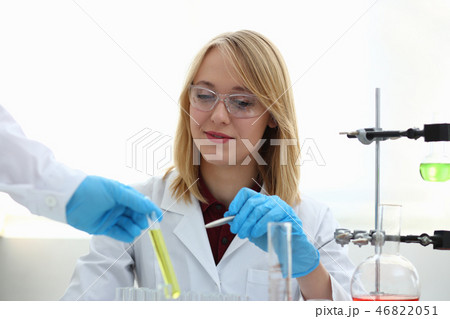 Technician hold in arms in protective gloves Technician hold in arms in protective gloves 46822051