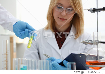 Technician hold in arms in protective gloves 46822320