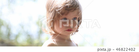Happy little smiling child on a natural background 46822402