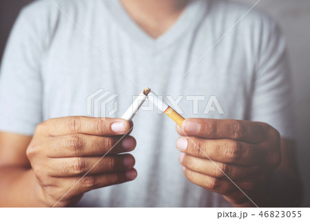 A new generation of businessman refusing cigarette A new generation of businessman refusing cigarette 46823055