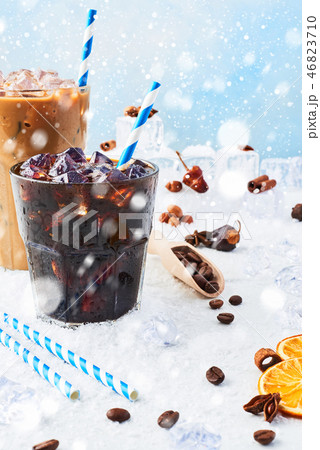 Winter drink iced coffee in a glass and spices Winter drink iced coffee in a glass and spices 46823710