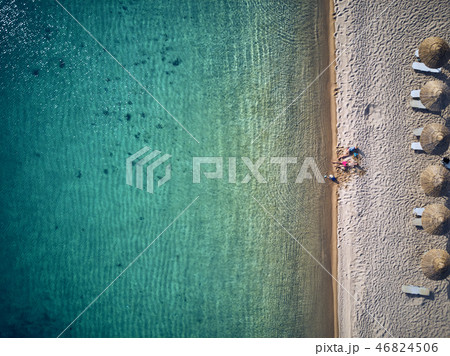 Beautiful beach with family drone shot Beautiful beach with family drone shot 46824506