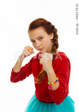 Nice serious girl being ready to fight Nice serious girl being ready to fight 46827610