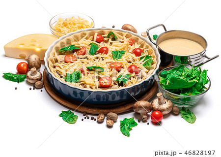 shortbread dough for baking quiche tart and filling in baking form 46828197