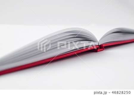 Perspective red notebook with open page Perspective red notebook with open page 46828250