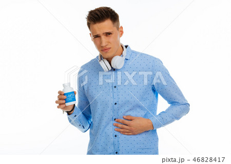 Sad depressed young man feeling strong pain Sad depressed young man feeling strong pain 46828417