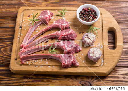 Raw ribs or rack of lamb and ingridient 46828756