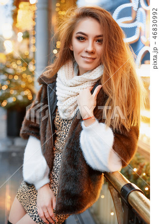 portrait of a young woman on the street near   46830992