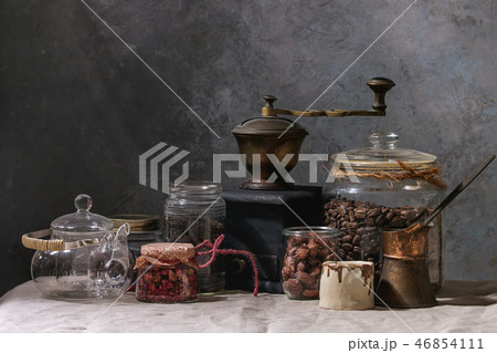 Coffee beans and tea in jars 46854111