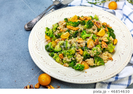 Quinoa, broccoli and walnut salad. 46854630