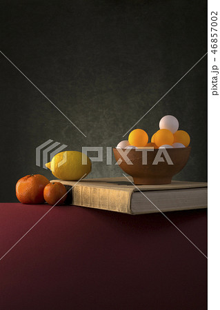 Still-life with fruit, a book and colorful balls Still-life with fruit, a book and colorful balls 46857002
