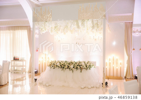 Decorated restaurant on the wedding day. Inside. Interiors 46859138