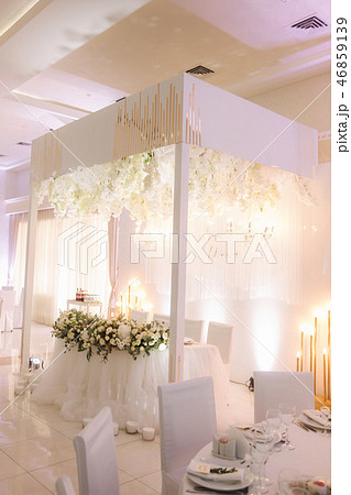 Floral elements of roof. Decorated chandelier on wedding 46859139