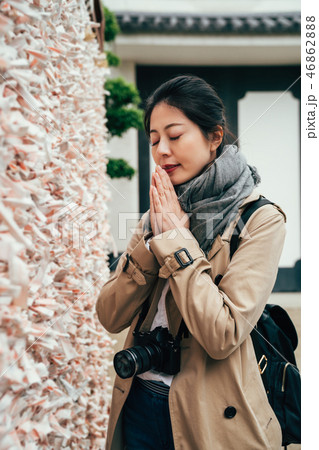young girl puts palms together praying young girl puts palms together praying 46862888