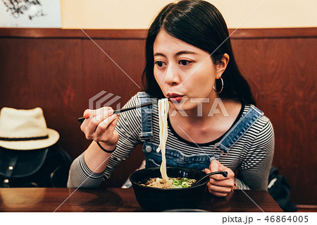 japanese lady having lunch in local restaurant japanese lady having lunch in local restaurant 46864005