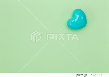 Blue heart shape on the green pastel Blue heart shape on the green pastel 46865387