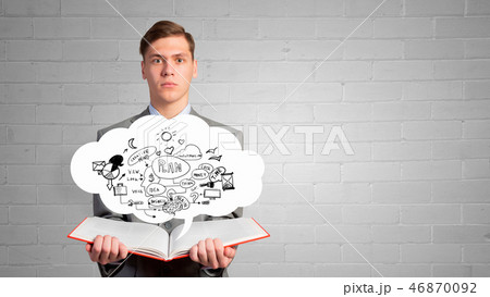Businessman with opened book 46870092