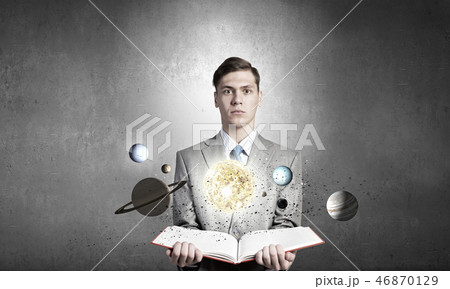 Businessman with opened book 46870129