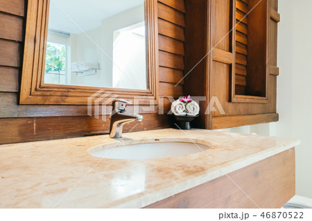 White sink and water facuet decoration in barhroom 46870522
