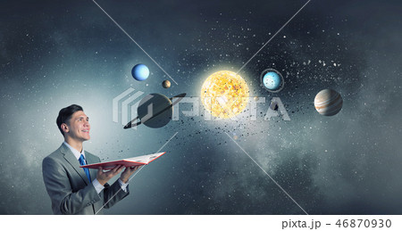 Businessman with opened book 46870930