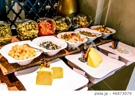 Variety food buffet table, wine snack set, olives, cheese and other appetizer, italian antipasti on 46873079