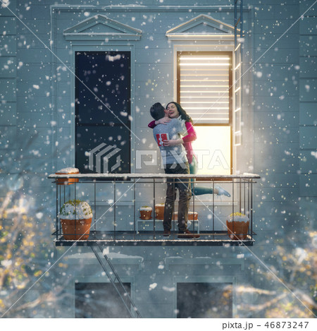 couple on balcony on Valentine's day couple on balcony on Valentine's day 46873247