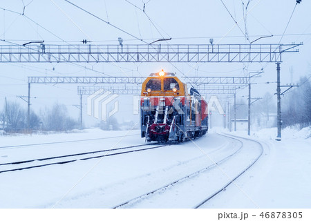 railway snow machine at station during snowfall 46878305
