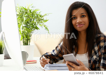 Young beautiful woman look camera holds Young beautiful woman look camera holds 46878641