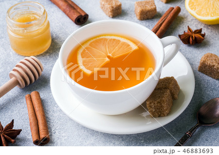 Cup of tea with lemon and brown sugar, cinnamon Cup of tea with lemon and brown sugar, cinnamon 46883693
