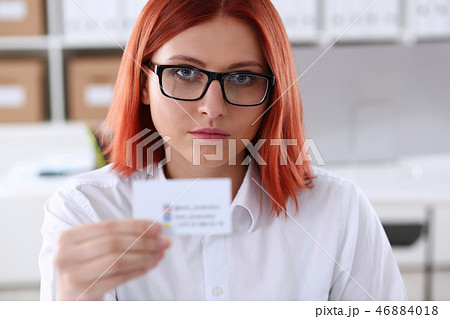 Female hand in suit give blank calling card Female hand in suit give blank calling card 46884018