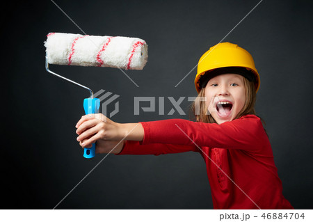 Decoration, renovation and reconstrucion concept. Painting girl 46884704