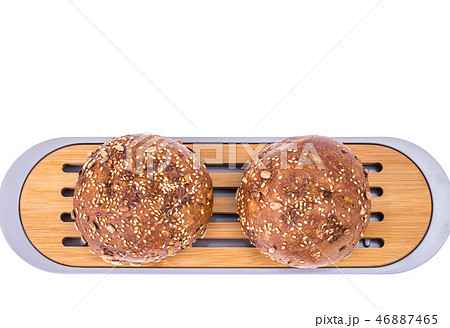 Round whole-wheat rye rolls with flax Round whole-wheat rye rolls with flax 46887465