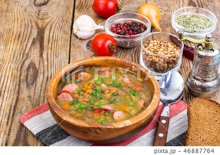 Country soup with lentils and sausages Country soup with lentils and sausages 46887764