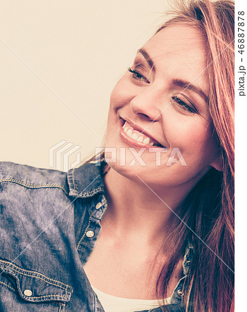 Happy smiling woman wearing jeans 46887878