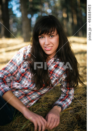 Attractive woman with country look Attractive woman with country look 46888403